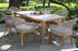 Outdoor Interiors® Teak & Sintered Stone Dining Set