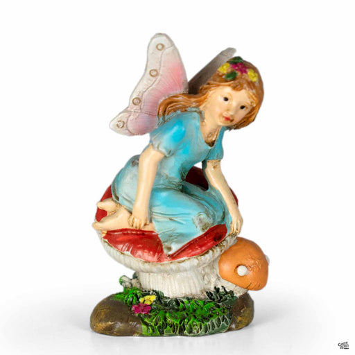 Fairy Perched on Mushroom