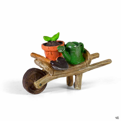 Wheelbarrow with Plant, Spade and Watering Can